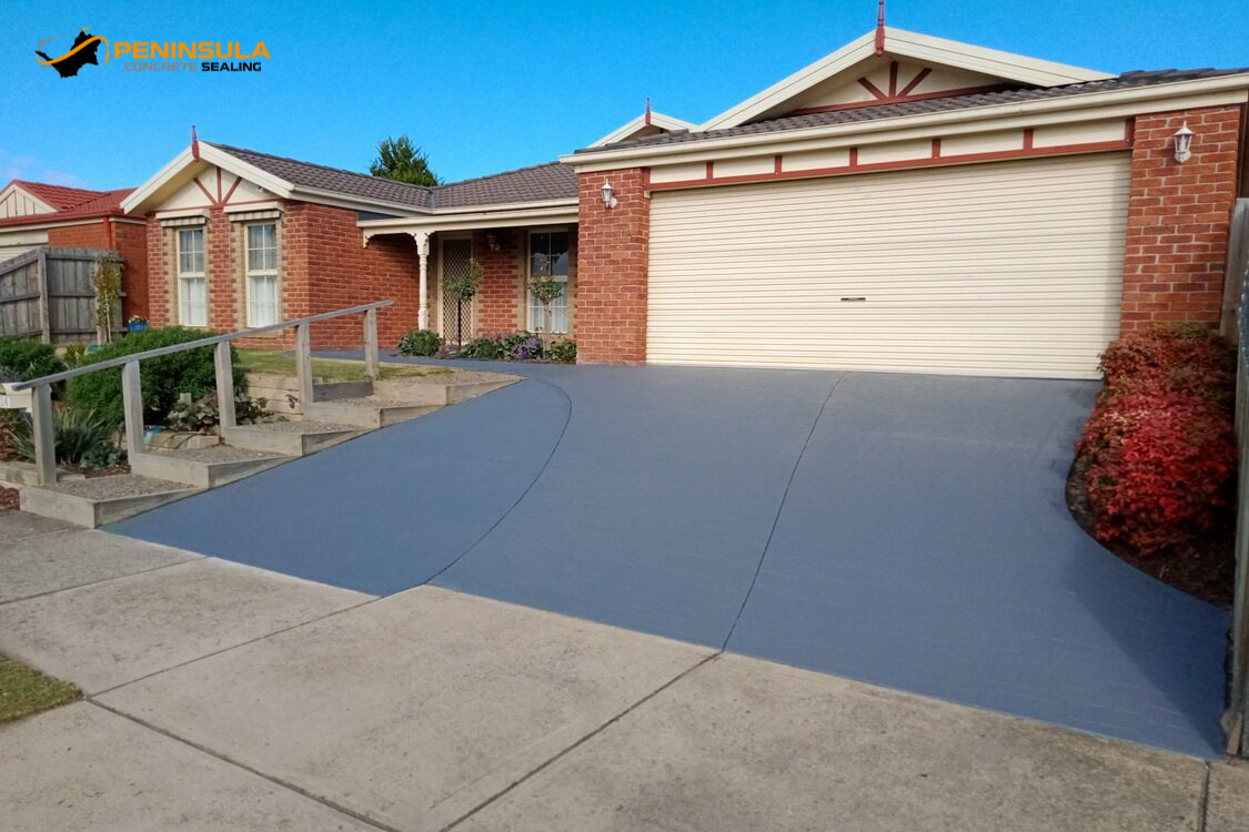 Mixed concrete driveway sealed in Nutech Pavecoat Basalt Carrum Downs